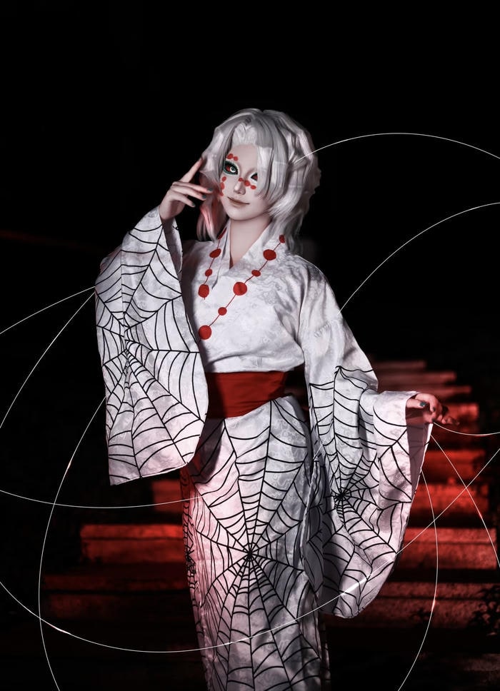 Hình cosplay Demon Slayer cô gái quỷ ánh nhìn u buồn